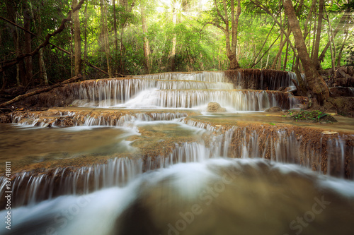 beauty sun ray over waterfall in nature, huay mae khamin nationa © whitestudio2015