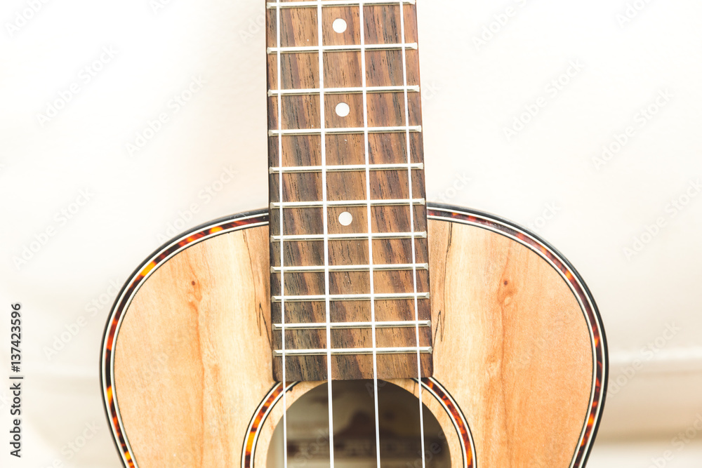 Obraz premium Upscale ukulele with woodgrain finish