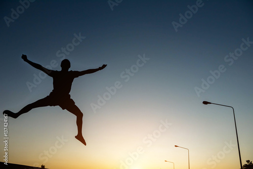 silhouette man Jump with happy