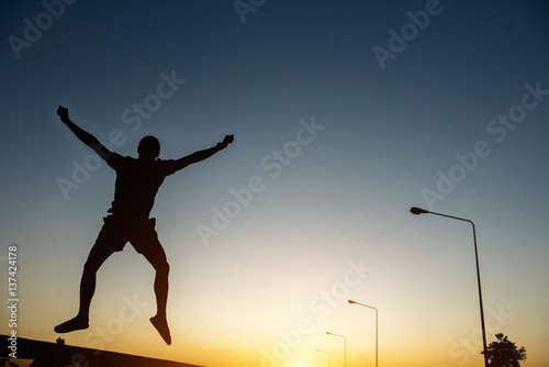 silhouette man Jump with happy