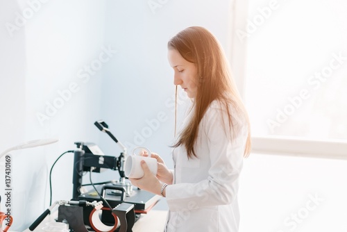Woman making thermal transfer print