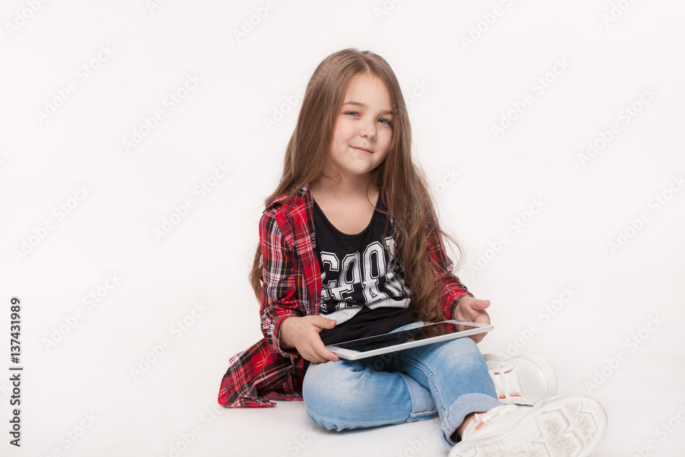 little student girl with tablet pc doing homework little student girl with tablet pc doing homework