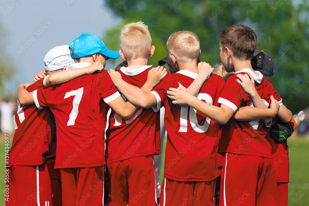 Children Soccer Team. Children Football Academy. Kids Soccer Players in Red  Shirts Standing Together on the Pitch. Youth Soccer Motivational Speech.  Coach Motivational Talk With Young Boys Stock Photo | Adobe Stock