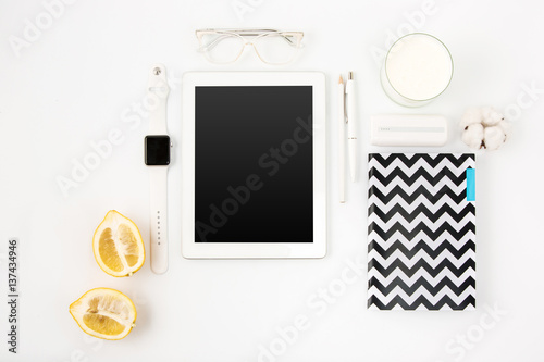 Top view of whitepink pastel office table. Flat lay image. photo