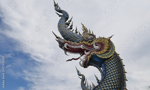King of Naga, Thai Dragon, temple in thailand background © kanchana