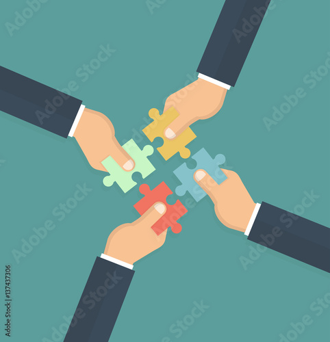 Teamwork and cooperation concept. Hands holding and putting puzzle pieces together. Vector illustration in flat style 