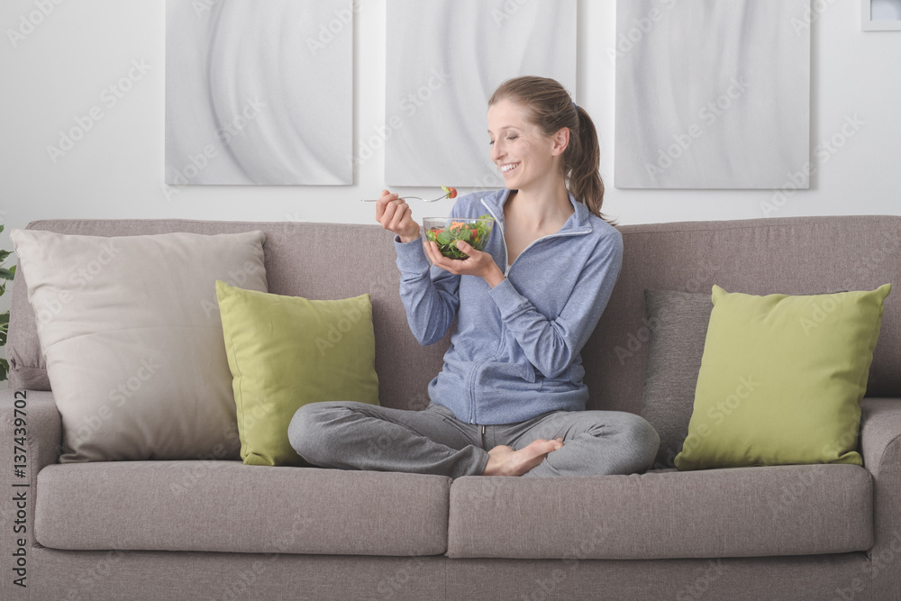 Young woman having lunch at home Young woman having lunch at home