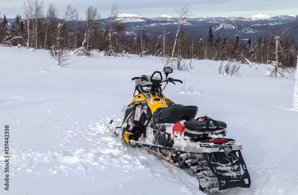 Snowmobile in the mountains