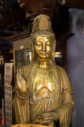 antique golden buddha statue