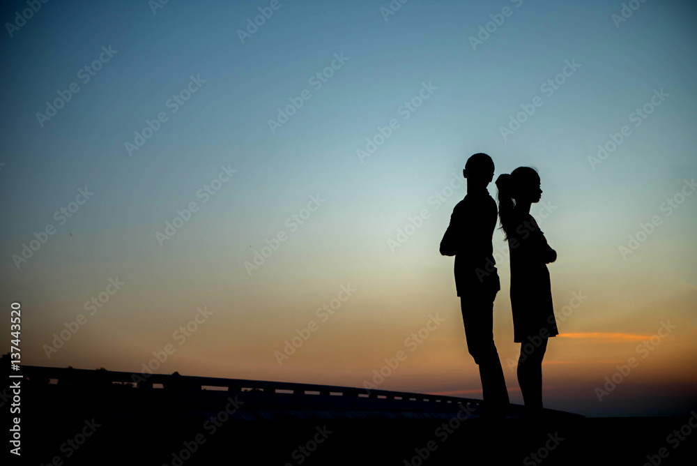 Silhouette couples in love the sky.