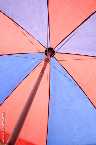 Low angle shot from Colorful Open umbrella 