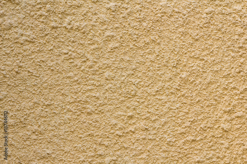 yellow cement wall, yellow rough concrete panel