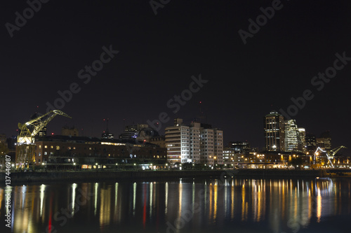 Buenos Aires, Argentina. Puerto Madero by night. it's a district at Buenos Aires, occupying a portion of the Río de la Plata riverbank and representing the latest architectural trends in Buenos Aires © Toniflap