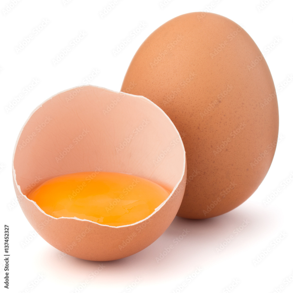 Broken egg in eggshell half and raw egg isolated on white background cutout Broken egg in eggshell half and raw egg isolated on white background cutout