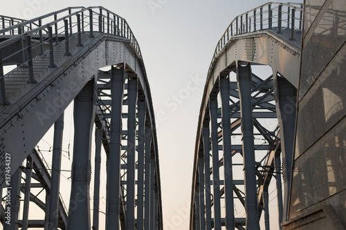 Railroad bridge. Arched girder