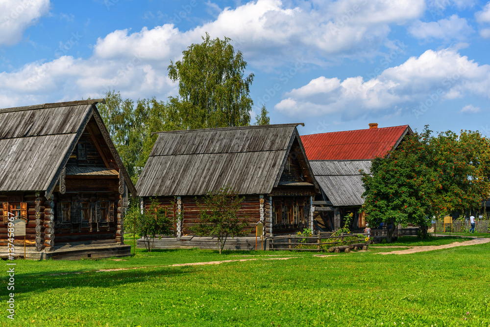 Old wooden rustic house a sunny summer day. Old wooden rustic house a sunny summer day.