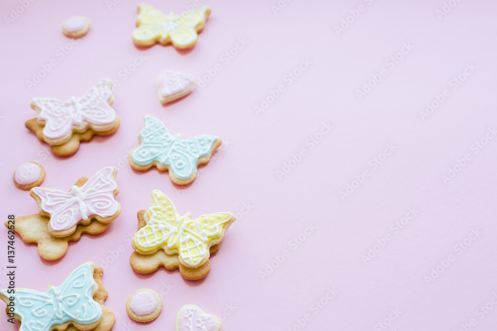 Homemade cookies-butterflies on pink background Homemade cookies-butterflies on pink background