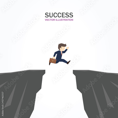 A man is jumping cross the abyss. Success concept.