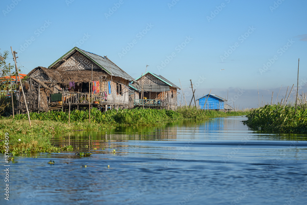 Traditional house and floating garden on Inle lake, myanmar Traditional house and floating garden on Inle lake, myanmar
