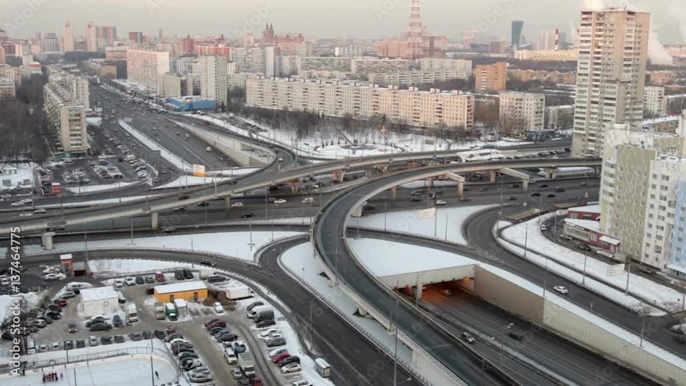 Traffic on the streets of Moscow Evening. Architecture and new areas with height Traffic on the streets of Moscow Evening. Architecture and new areas with height