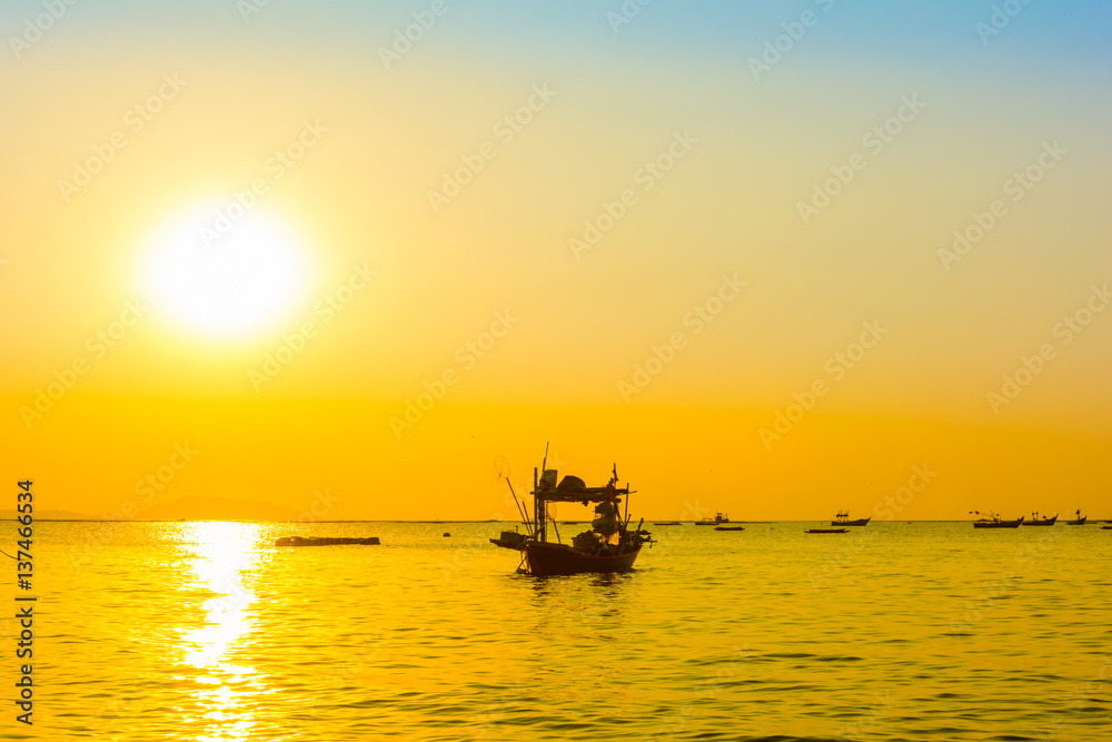 Boat and the beach with sunset background Boat and the beach with sunset background