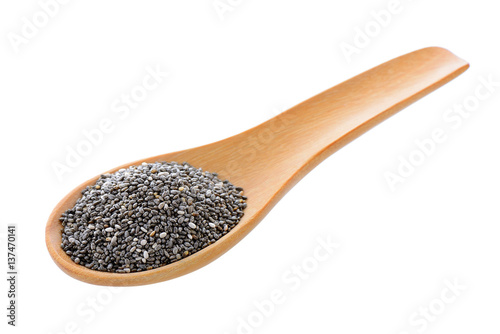 Chia seeds in wood spoon isolated on white background.