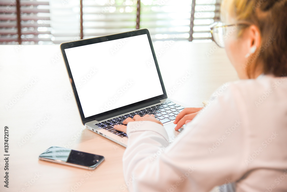 Businesswoman with laptop and smartphone Businesswoman with laptop and smartphone