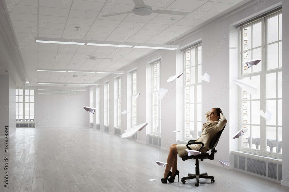 Fototapeta premium Lady boss in office chair . Mixed media