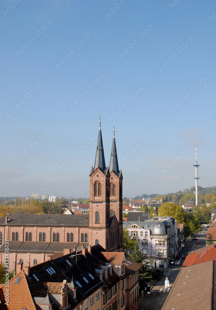 high angle view towards the Peter and paul church with the communication tower in the background, Lahr Baden Germany 