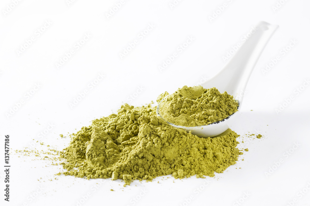 Matcha Green Tea and spoon isolated on white background
Matcha Green Tea and spoon isolated on white background