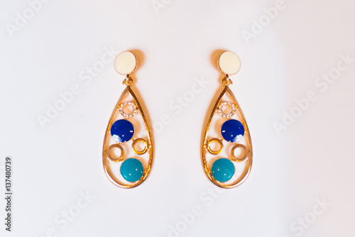 metal earrings with colored stones