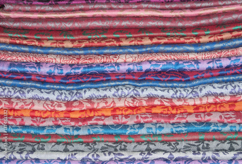 Background of eastern colorful stoles stacked
