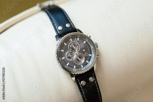 Men's watch with black leather band