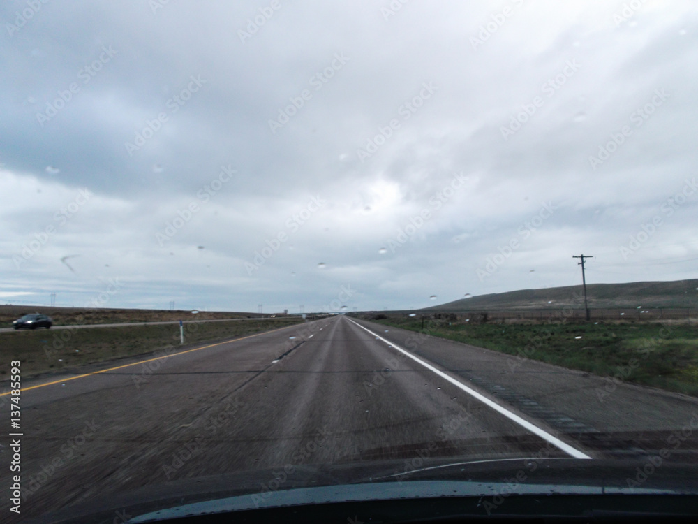 Road shot from car on American country road through USA