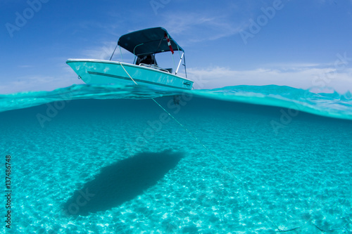 Stationary boat on sea in sunshine, Staniel Cay, Bahamas, Caribbean  photo