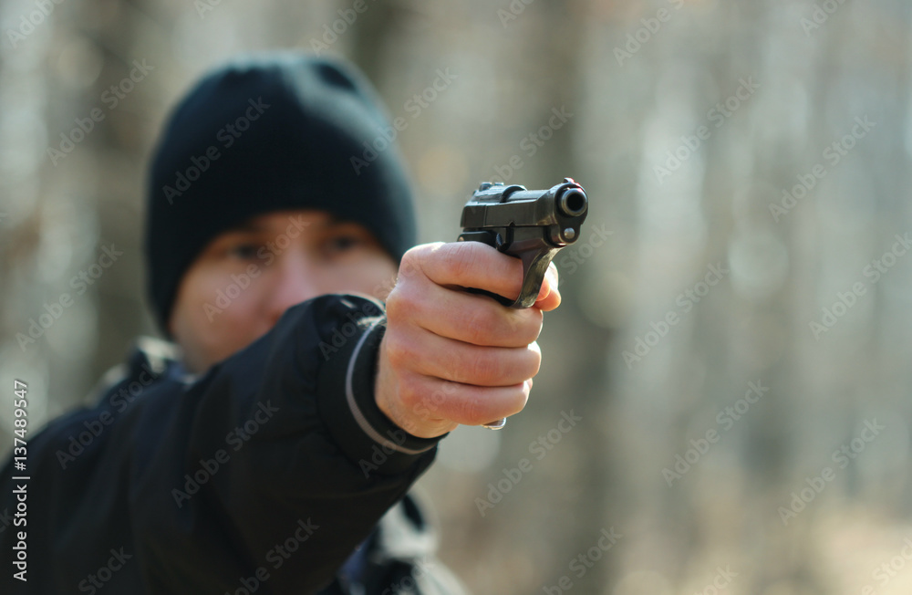 Man with a gun Man with a gun