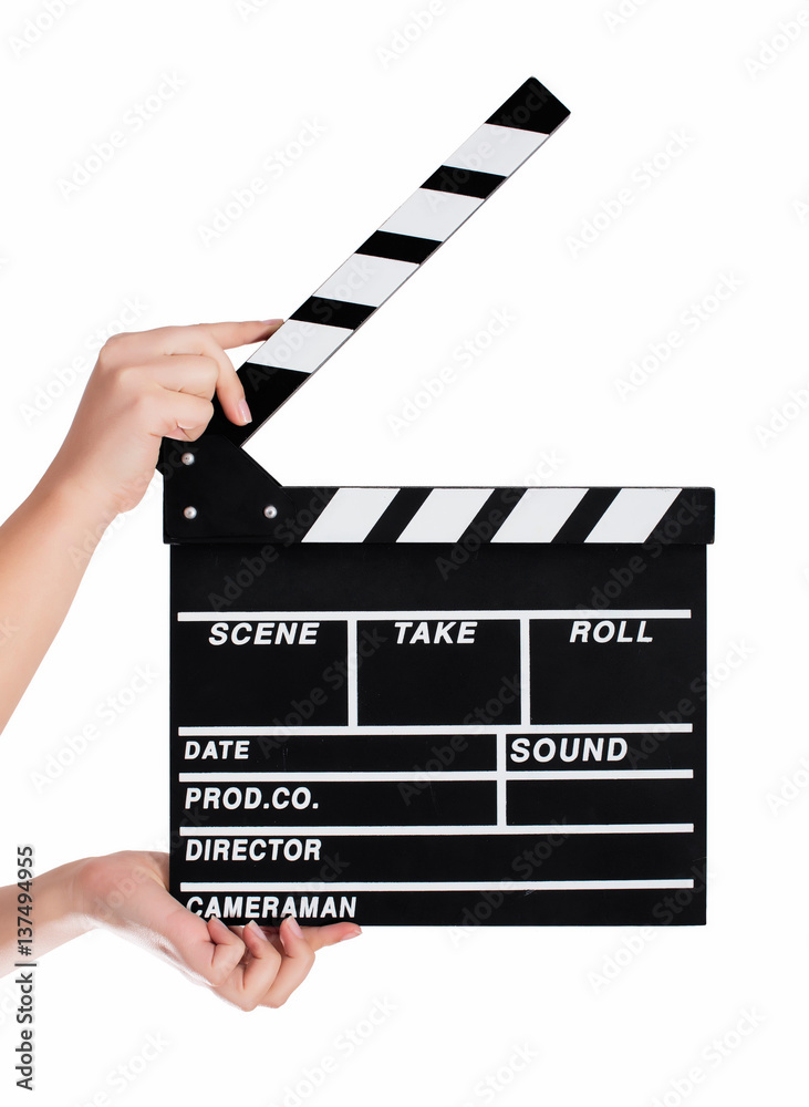Hands holding a clapper board