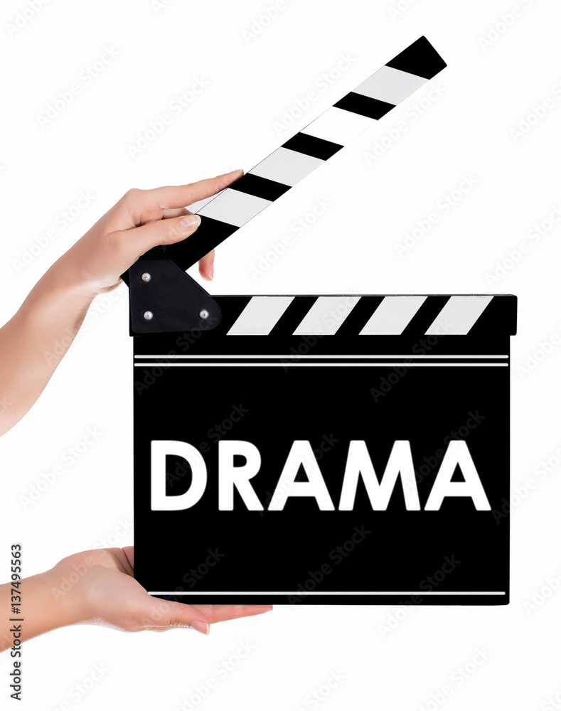 Hands holding a clapper board with DRAMA text