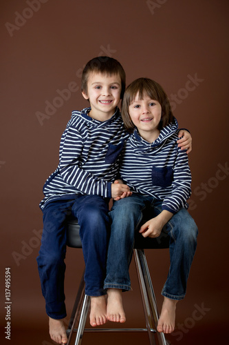 Double portrait of two boys, brothers