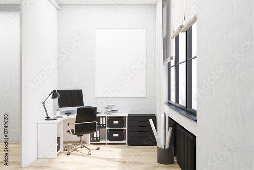 White walled office with poster
