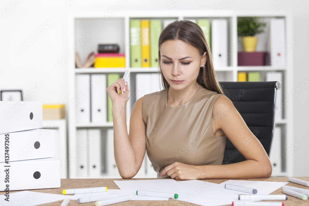 Portrait of a determined blond woman with marker Portrait of a determined blond woman with marker