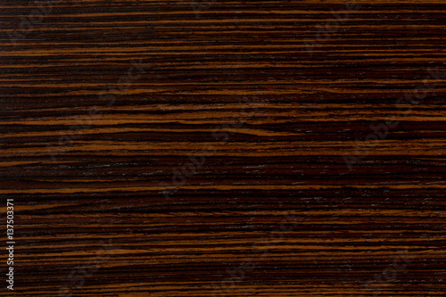 Dark ebony wood background, exclusive natural texture with patterns. photo