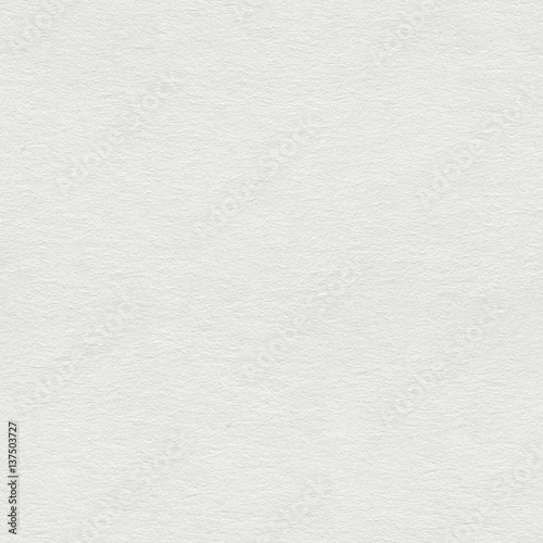 Texture of white paper closeup. Seamless square background, tile ready.