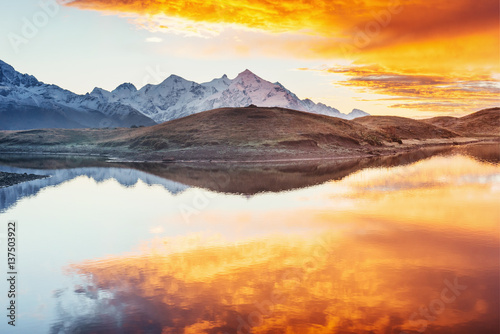 Sunset on mountain lake Koruldi. Upper Svaneti, Georgia, Europe.