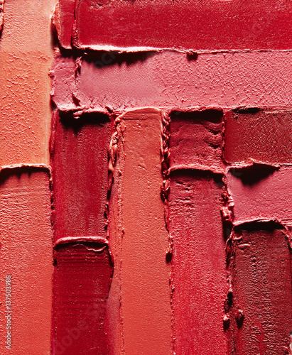 Shades of lipstick in textured pattern photo