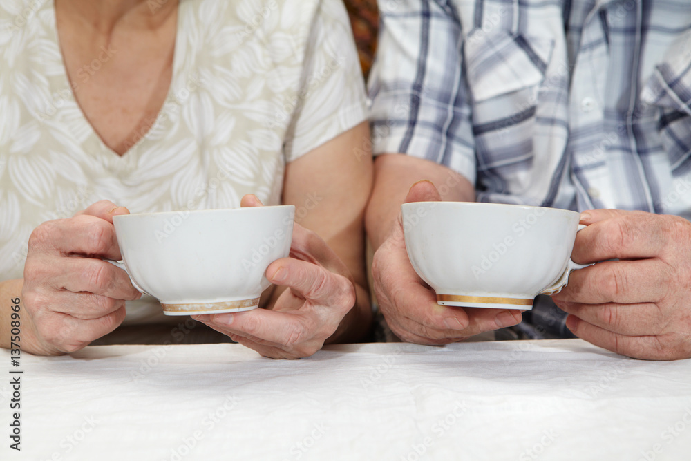 Elderly couple drinking tea Elderly couple drinking tea