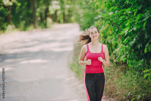 sport girl it the gym and on the jog © hetmanstock2
