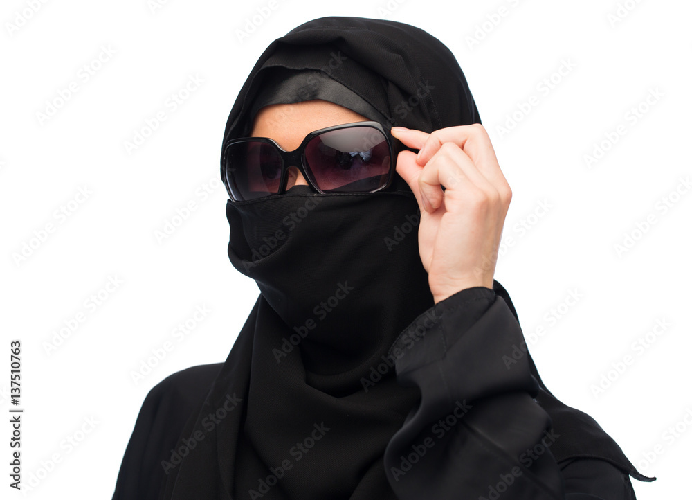 muslim woman in hijab and sunglasses over white muslim woman in hijab and sunglasses over white