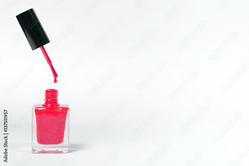 Fototapeta premium nail polish bottle on white background with space for your text