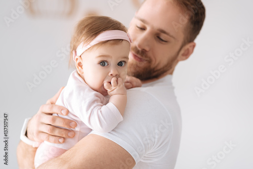 Lovely child expressing emotions with the father
